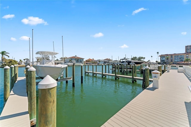 view of dock featuring a water view and boat lift