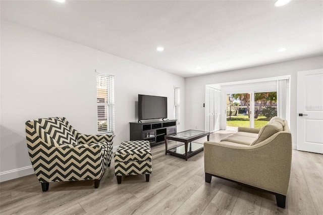 2101 Cordova Grn, Seminole, FL 33777 - living area with baseboards, light wood-type flooring, and recessed lighting