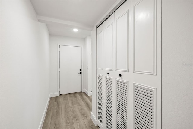 2101 Cordova Grn, Seminole, FL 33777 - hall with light wood-type flooring and baseboards