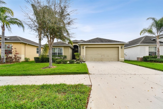 ranch-style home featuring concrete driveway, a front lawn, an attached garage, and stucco siding