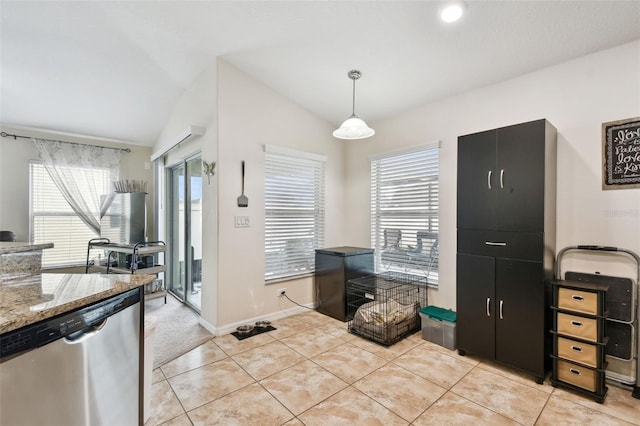 dining room with lofted ceiling, light tile patterned floors, baseboards, and a healthy amount of sunlight