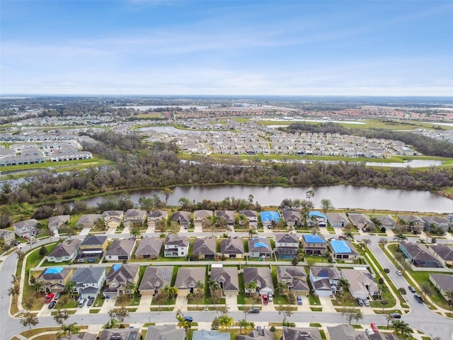 aerial view with a water view and a residential view