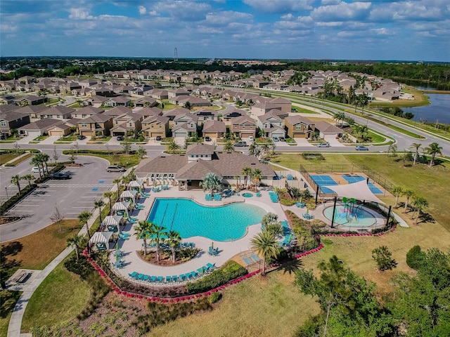 aerial view with a water view and a residential view