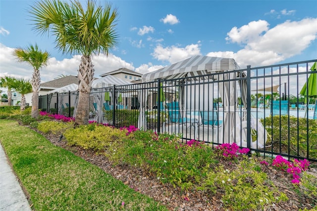 community pool featuring fence