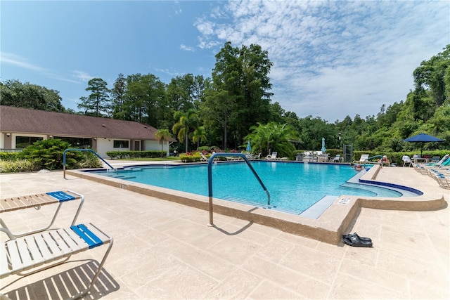 pool with a patio