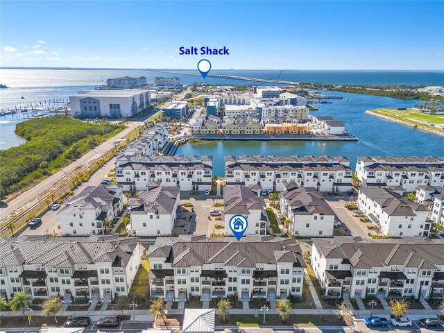 bird's eye view featuring a residential view and a water view