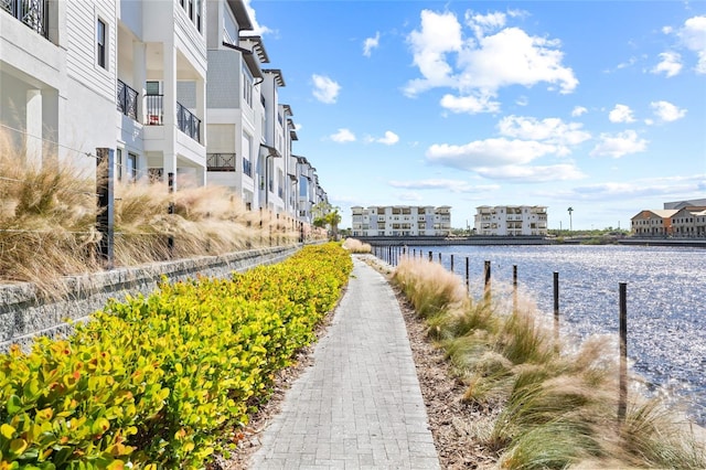 view of community featuring a water view