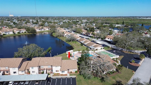 aerial view with a residential view and a water view