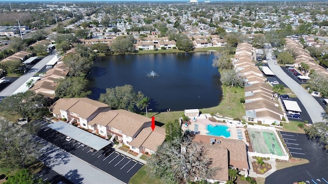 aerial view featuring a water view and a residential view