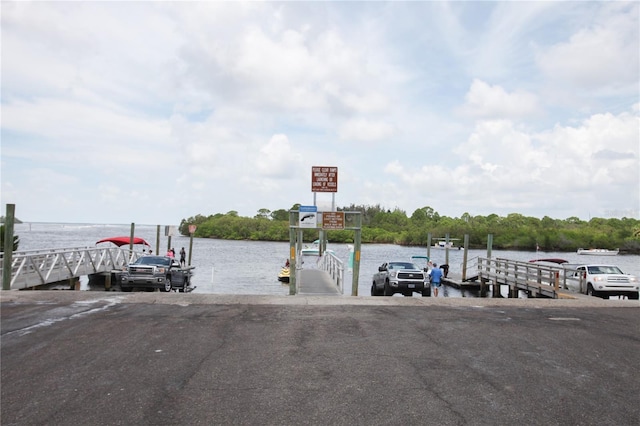 dock area with a water view