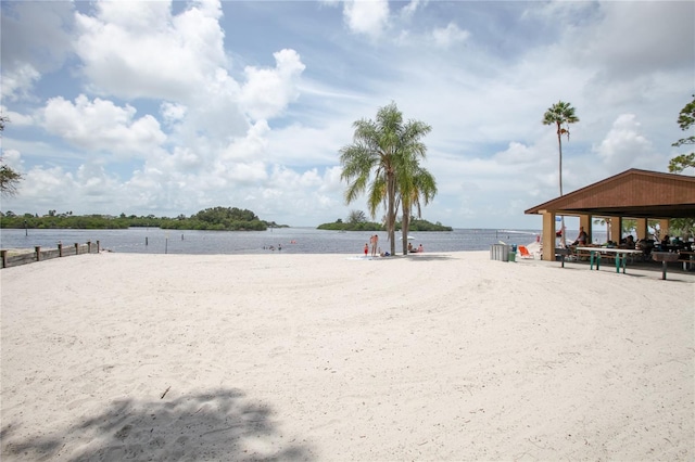 view of yard featuring a gazebo and a water view