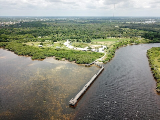 aerial view featuring a water view and a forest view