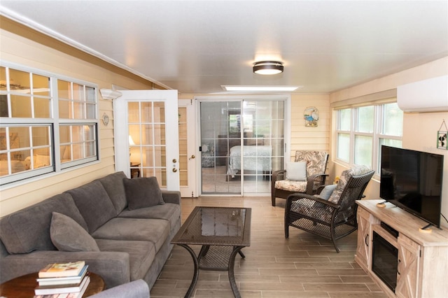 living area with wood finish floors