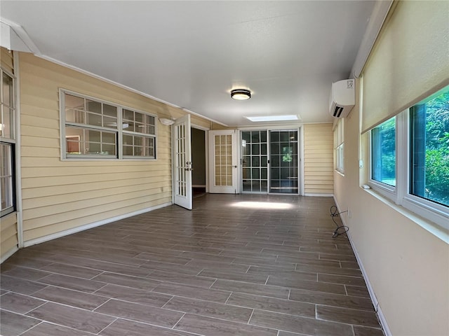 11722 Currie Ln Unit G1, Largo, FL 33774 - unfurnished sunroom featuring an AC wall unit