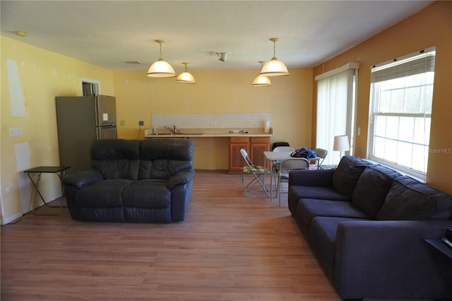 living area with light wood finished floors