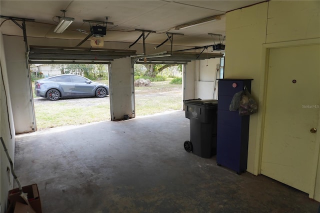 garage featuring a garage door opener