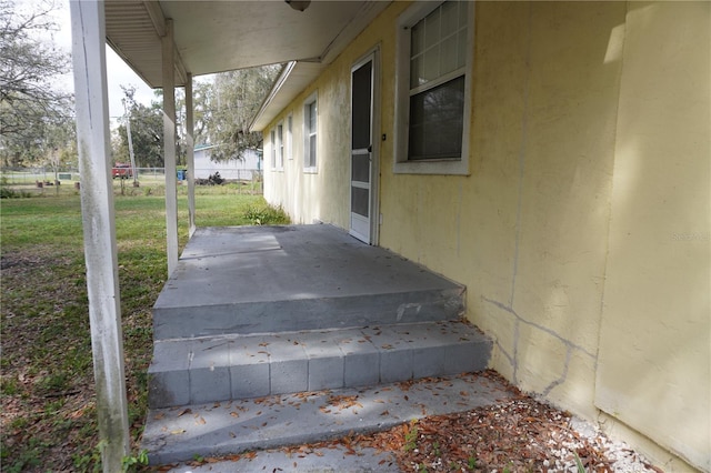 view of patio / terrace featuring fence