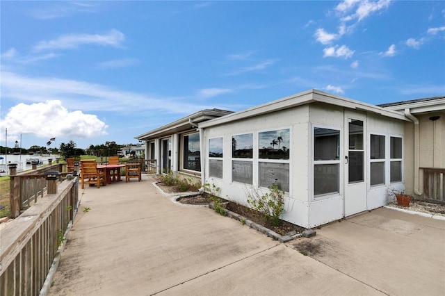 view of home's exterior featuring a patio area