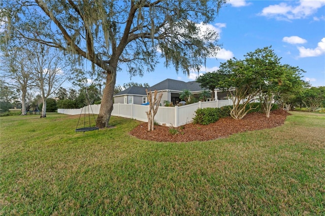 view of yard featuring fence