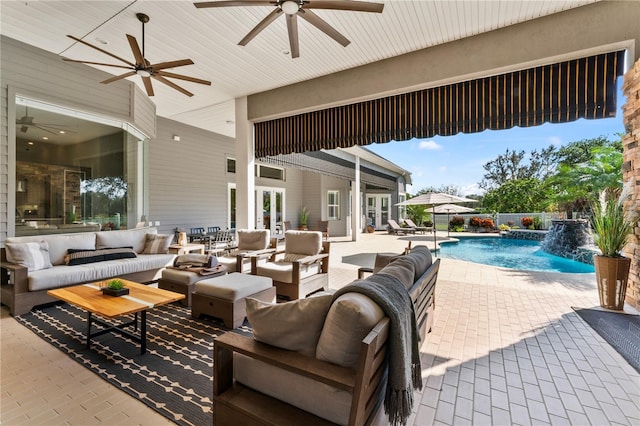 view of patio featuring a fenced in pool, french doors, outdoor lounge area, and a ceiling fan