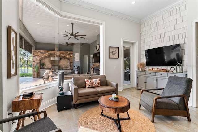 living room featuring ornamental molding, recessed lighting, ceiling fan, and baseboards