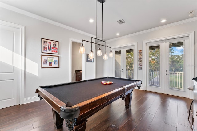 recreation room featuring french doors, crown molding, dark wood finished floors, a wealth of natural light, and visible vents