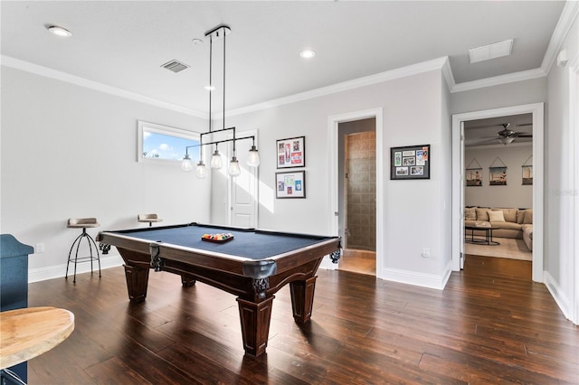 game room with ornamental molding, visible vents, baseboards, and wood finished floors