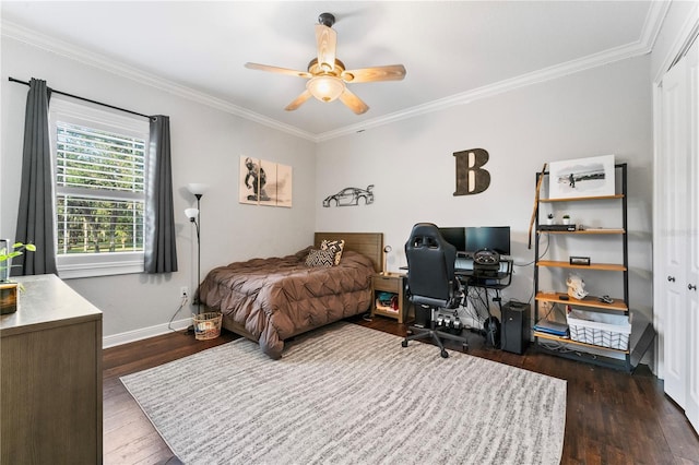 bedroom with baseboards, dark wood-type flooring, a ceiling fan, and crown molding