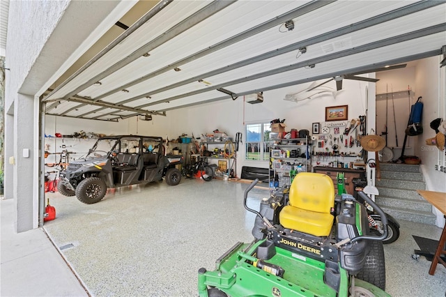 garage with a workshop area