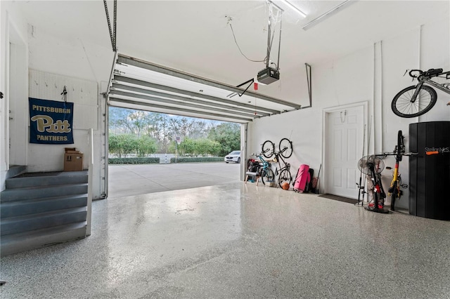 garage featuring a garage door opener