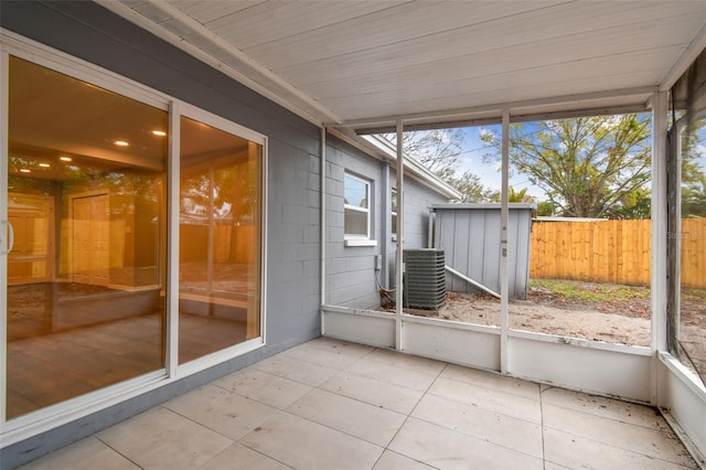 unfurnished sunroom featuring a healthy amount of sunlight