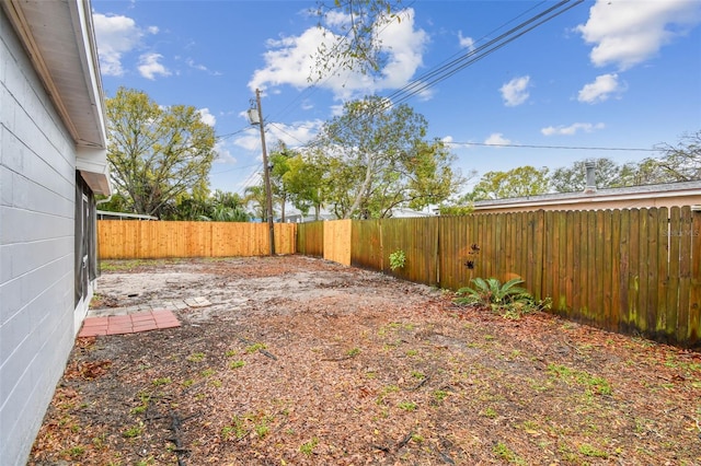 view of yard featuring a fenced backyard