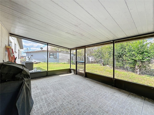 view of unfurnished sunroom