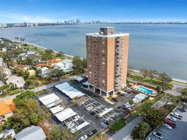 bird's eye view featuring a water view and a city view