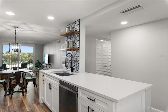 kitchen featuring visible vents, dishwasher, light countertops, white cabinetry, and open shelves