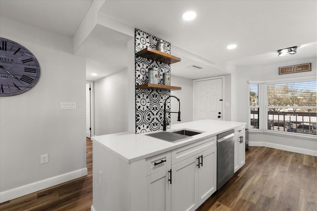 kitchen featuring a sink, white cabinetry, light countertops, dishwasher, and open shelves