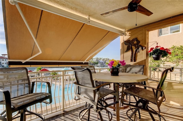 balcony with a ceiling fan