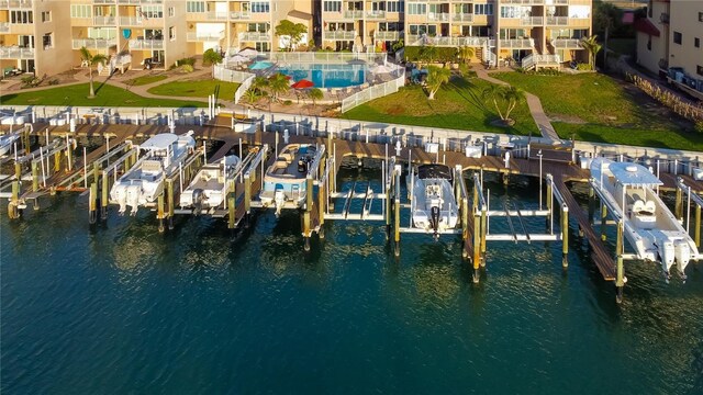 dock area featuring a water view and boat lift