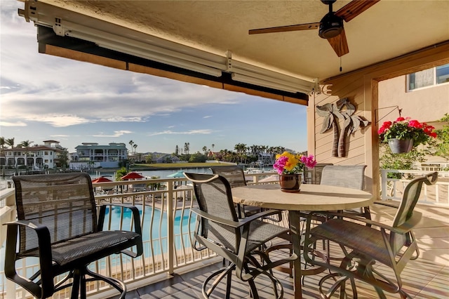 exterior space with a ceiling fan and outdoor dining space