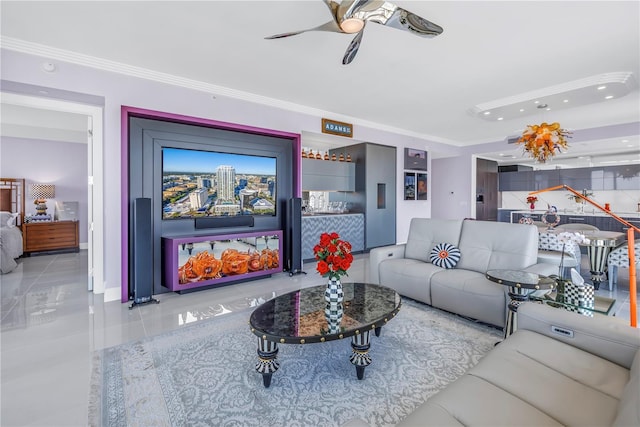 living room with a ceiling fan, light tile patterned flooring, and crown molding