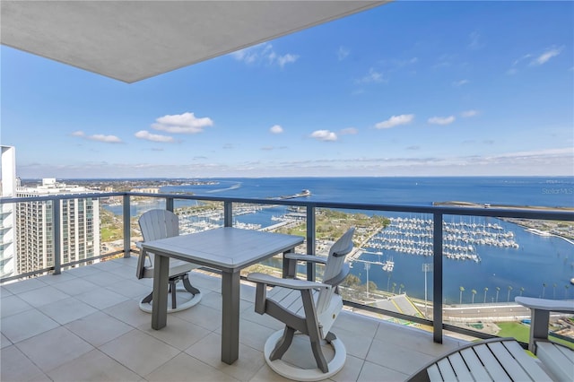 balcony featuring a water view