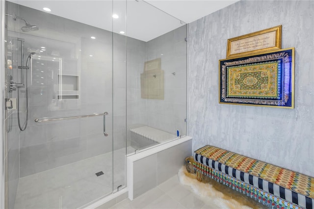 bathroom featuring a stall shower and tile patterned floors