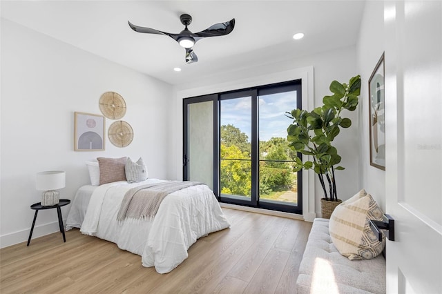 bedroom with light wood-type flooring, ceiling fan, baseboards, and recessed lighting