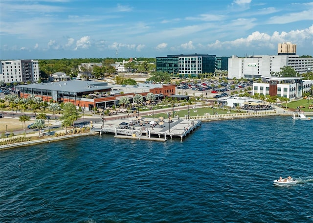 bird's eye view featuring a view of city and a water view