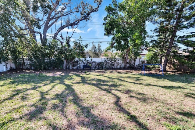 view of yard with a fenced backyard