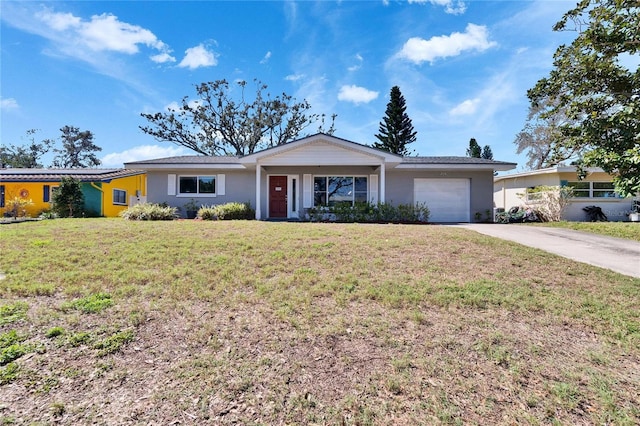 ranch-style house featuring driveway, stucco siding, an attached garage, and a front yard