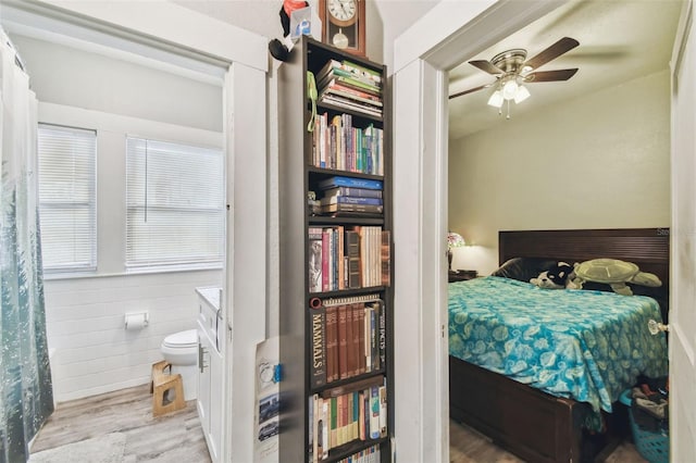 bedroom featuring wood finished floors