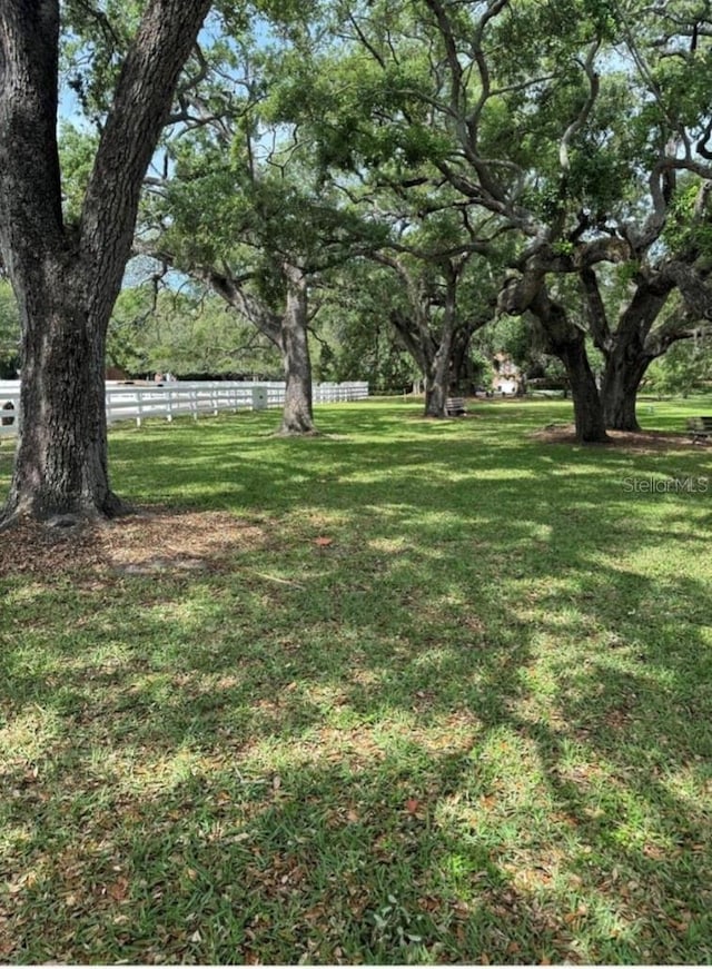 view of yard featuring fence