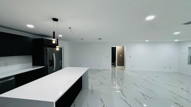 kitchen with open floor plan, black appliances, dark cabinetry, and marble finish floor