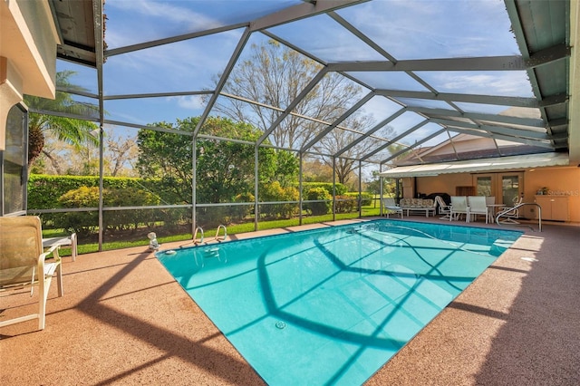 pool featuring a lanai and a patio